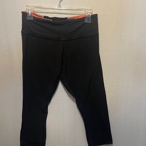 lululemon athletica Black Capris with Orange Trim